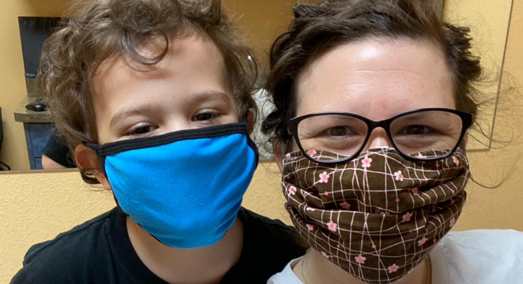 Mom and son wearing masks