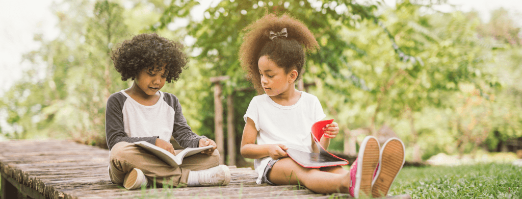 siblings reading outside, Books for Reluctant Readers
