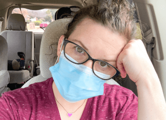 tired mom wearing mask