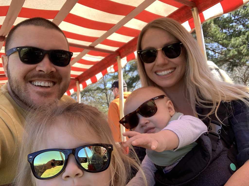 smiling family in sunglasses, day trips from frisco plano mckinney