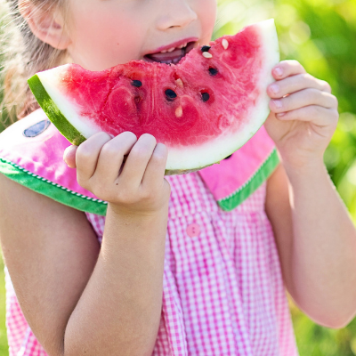 summer photo prompts, child eating watermelon