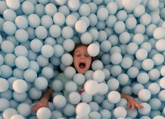 Playing in the Ball Pit at The Color Factory in New York