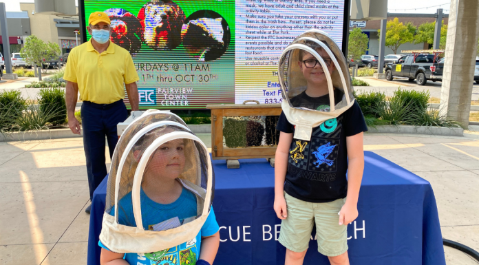 kids wearing beekeeping hats at Critter Club presentation