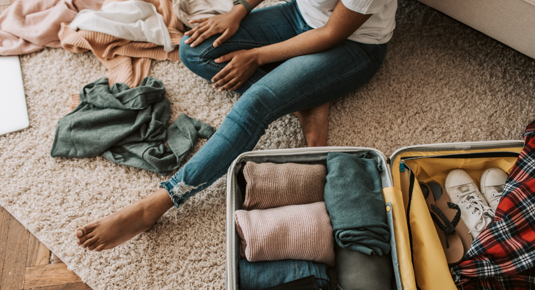 A Woman Packing Her Suitcase, how to pack for a family vacation