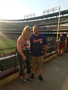 man and woman at Rangers game