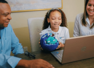 daughter in virtual school as parents look on, GREAT HEARTS ONLINE DFW HOMESCHOOL OPTIONS