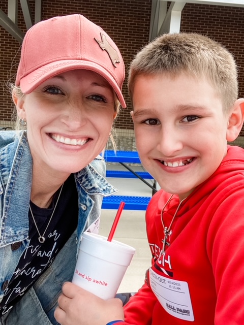 mom and son smiling at sonic, kid date ideas in dallas