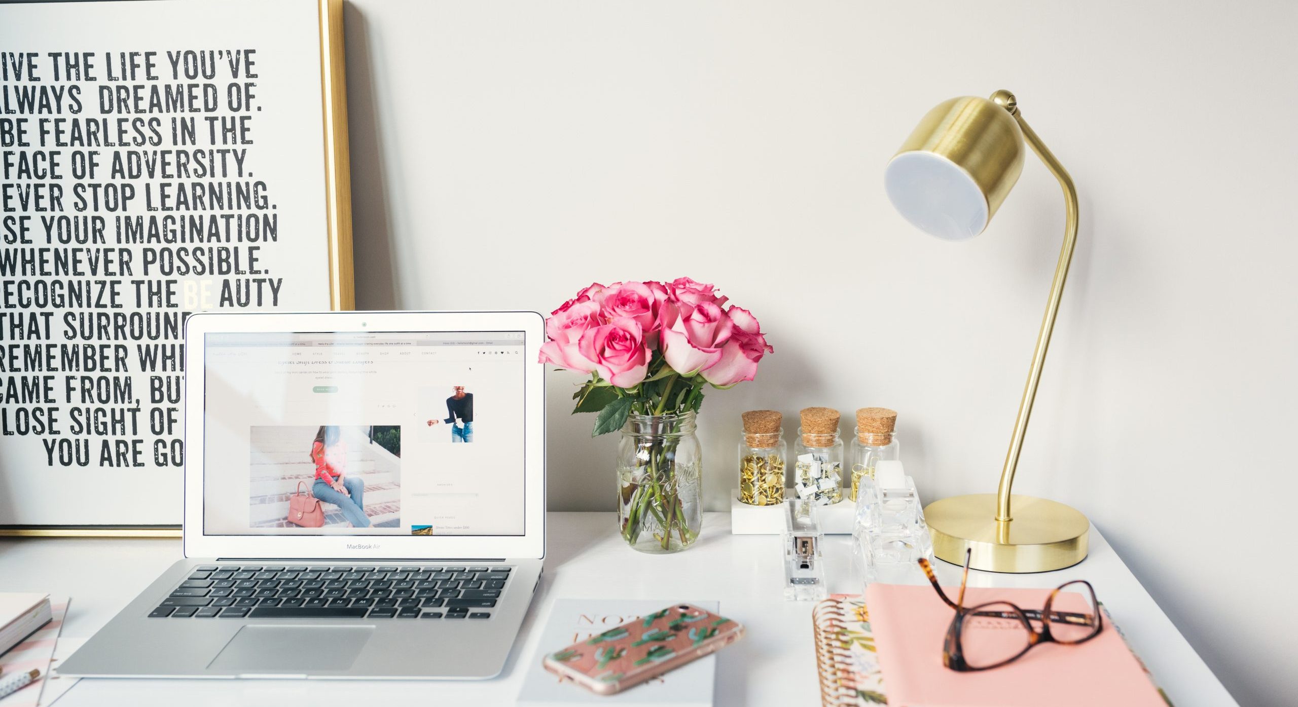 pretty desk with flowers and laptop, quit your job and change careers