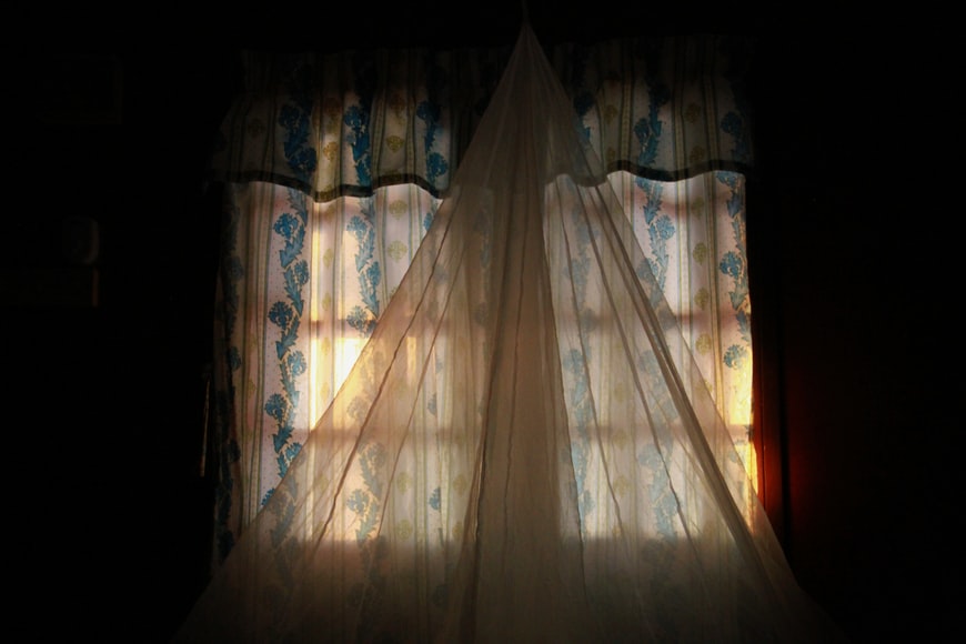 curtain window in a dark room, secret mental illness