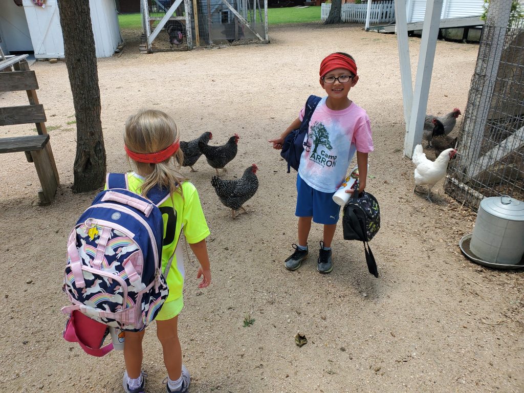 2 young children at Heritage Farmstead Museum summer camp