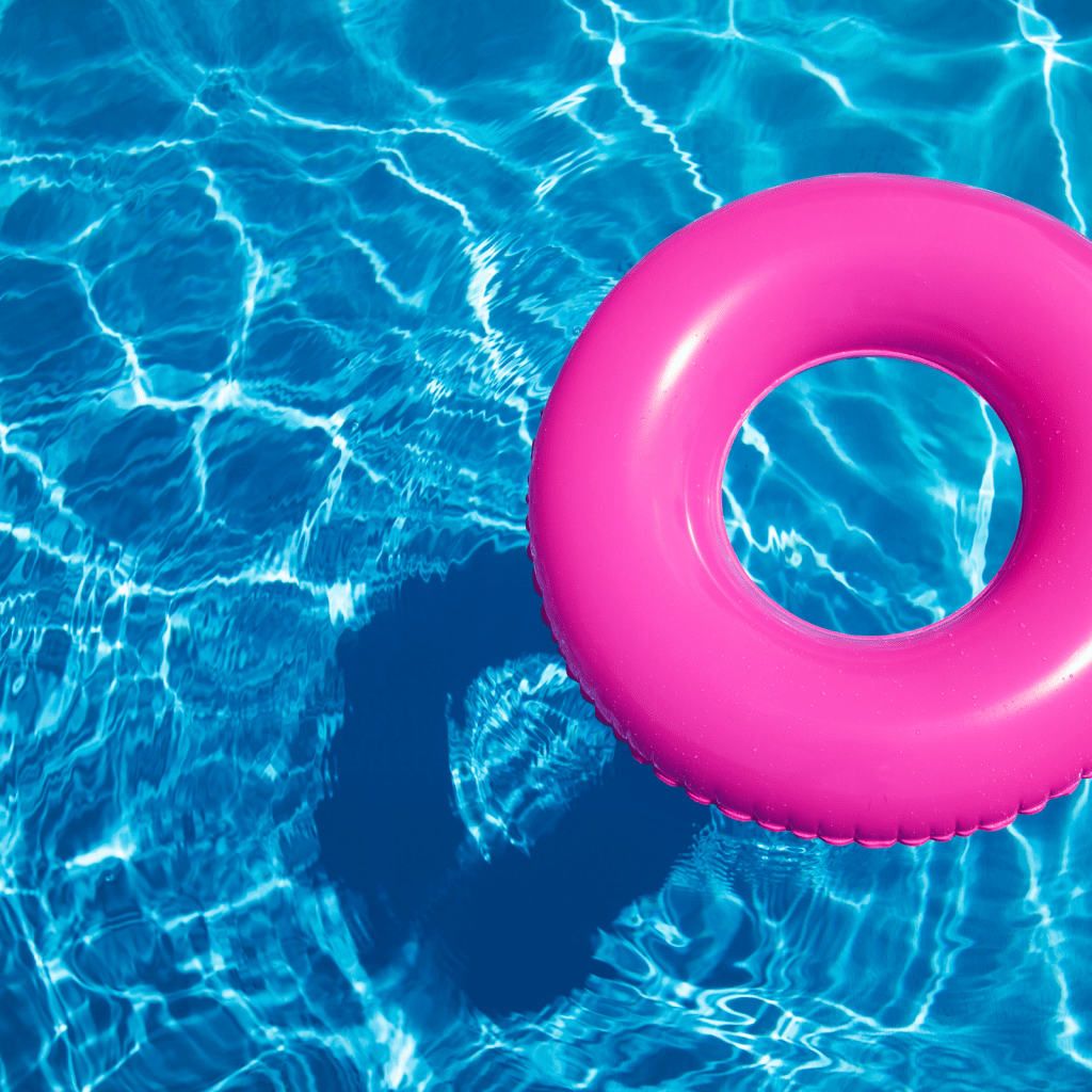 pink inner tube in a swimming pool