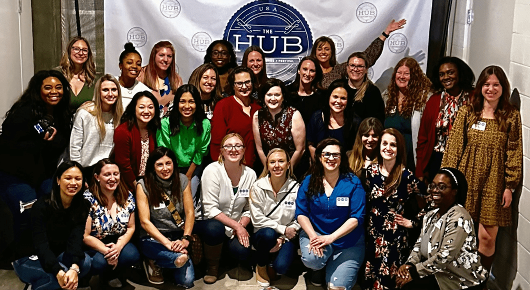group shot of Dallas Moms, Collin County Moms, and Fort Worth Moms team members at The HUB
