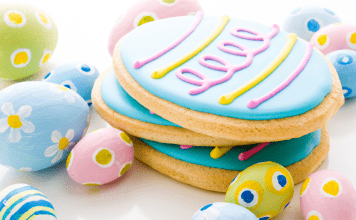 colorful easter cookies shaped and decorated like eggs