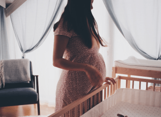 pregnant woman in nursery