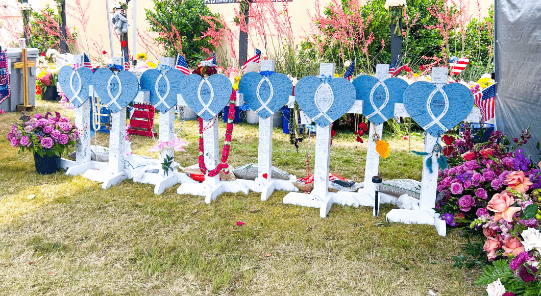 Allen Shooting Memorial display with eight crosses