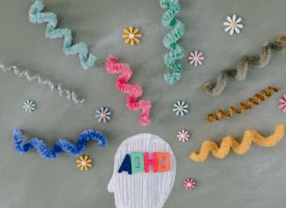 An illustration of a head with pipe cleaners coming out the top illustrating unorganized thoughts related to ADHD.