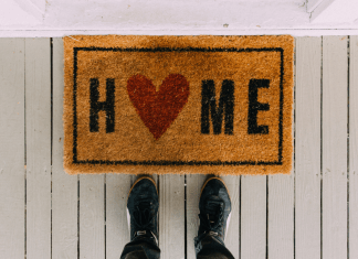 A doormat with the word "home" on it.