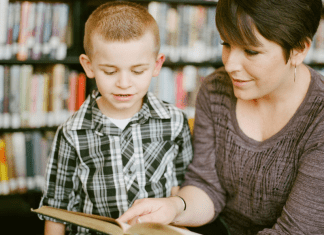 A mother reading with her son.