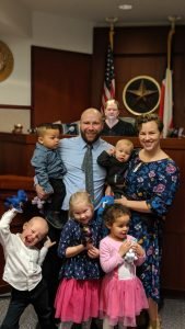 Completed family after an adoption at the Collin County Family Court.